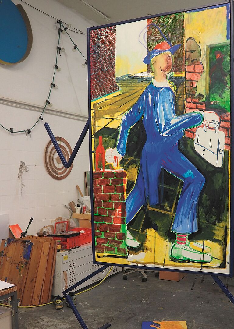 Foto eines mannshohen Gemäldes in einer Werkstatt 