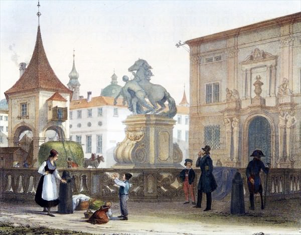 Die Pferdeschwemme im Hintergrund der Heuwagen, links im Bild das Portal des heutigen Festspielhauses von Fischer von Erlach.